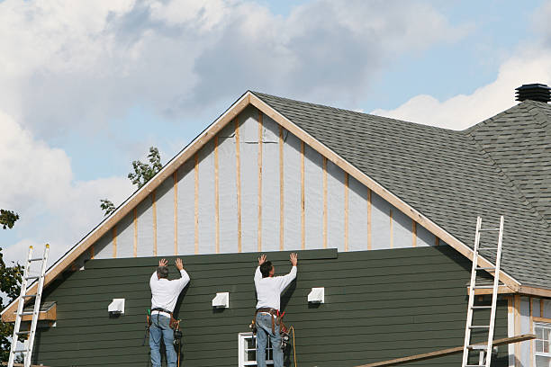 Professional Siding Repair technician working in Winburne, PA